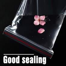 100 قطعة أكياس بلاستيكية قابلة لإعادة الإغلاق بأحجام من 4 سم إلى 30 سم، أكياس سحاب إعادة الاستخدام، سمك 0.062 مم/2.44 ميل، أكياس تعبئة مجوهرات شفافة، أكياس تعبئة هدايا أعياد الميلاد والذكرى السنوية، أكياس ملحقات أدوات متعددة الأغراض، أكياس تعبئة هدايا المناسبات، أكياس فراغية بلاستيكية، أكياس لاصقة شفافة، صناديق تخزين ملحقات الملابس، مناسبة للشحن والسفر والتخزين والتعبئة والهدايا وأعياد الميلاد والذكرى السنوية والزفاف - 100 قطعة - مشاهدة 10