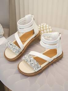 Giày sandal đính ngọc trai sequin mới cho bé gái mùa Xuân/Hè 2026, sandal đế bằng kiểu La Mã với hai quai ngang mắt cá chân, đa năng cho tiệc tùng và kỳ nghỉ. - Màu be - Xem 4