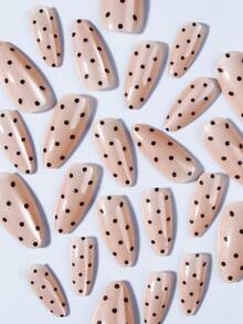 24片杏仁形黑色波点猫眼美甲贴纸，亚克力按压式美甲，包含1片果冻胶和1个指甲锉。波点和猫眼美甲让您的指尖闪耀夺目，适合派对、跳舞和日常使用。美甲用品 - 彩色 - 查看 3