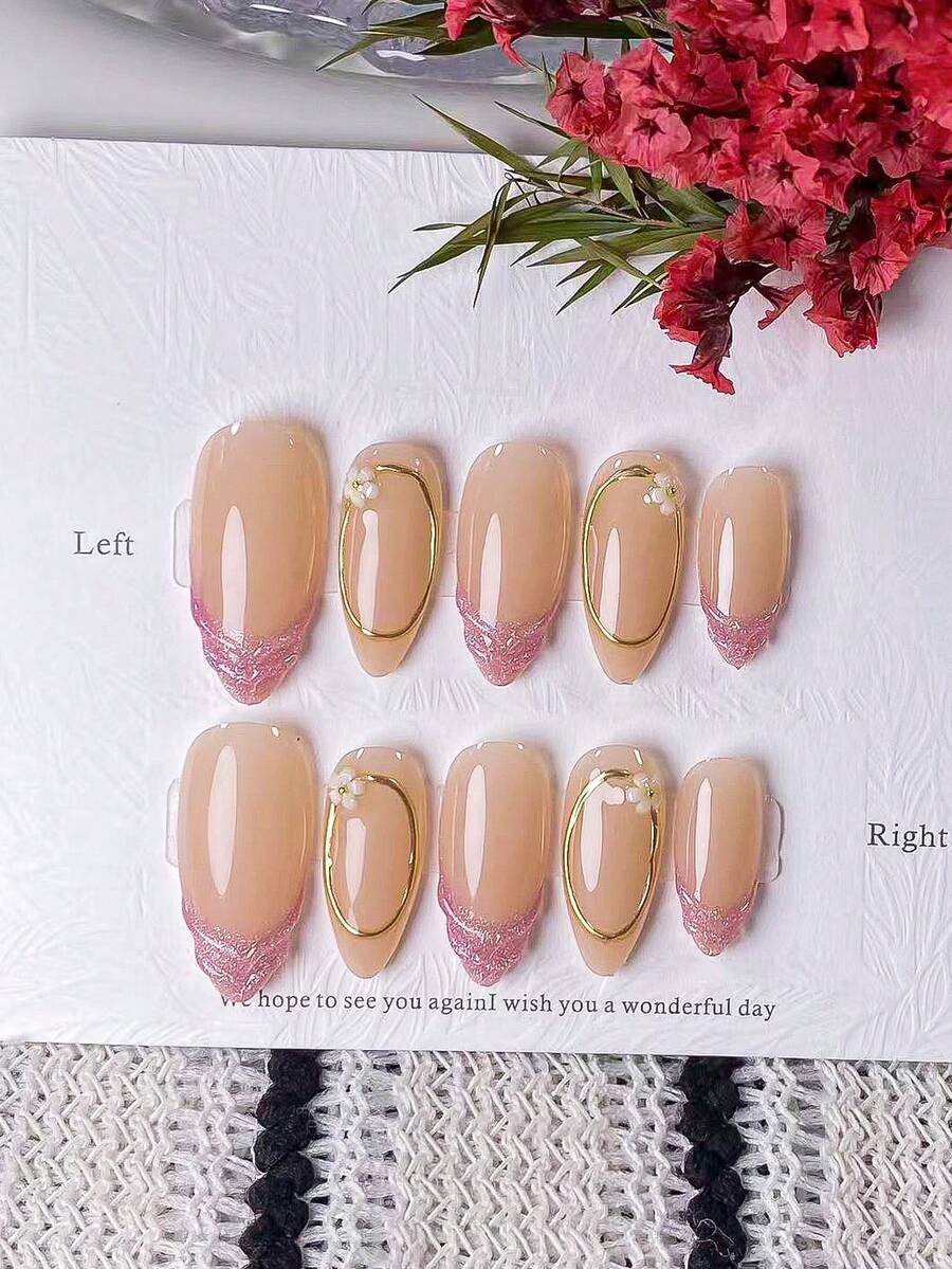 10 miếng dán móng tay giả hình hạnh nhân màu hồng nude bóng bẩy kiểu Pháp, làm thủ công, với họa tiết sóng 3D. Những miếng dán móng này có đầu móng kiểu Pháp màu hồng được vẽ tay với các đường tròn vàng 3D, và được trang trí bằng các họa tiết sóng 3D dập nổi tinh xảo và các họa tiết hoa anh đào trắng nhẹ nhàng. (Dụng cụ làm móng) - Nhiều màu - Xem 1