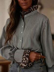 Áo sơ mi nữ ôm dáng mùa xuân và thu này có thiết kế họa tiết da báo, với chất liệu vải thoải mái. Thích hợp cho việc đi làm hàng ngày và những buổi đi chơi thường ngày. Một chiếc áo sơ mi nữ thanh lịch, một chiếc áo dài tay nữ phối họa tiết da báo, một chiếc áo sơ mi kẻ sọc nữ quyến rũ. - Đen và trắng - Xem 6