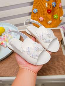 1双女童春夏新款蝴蝶结水钻软底露趾平底公主凉鞋，儿童多功能防滑罗马鞋，适合旅行、度假和上学穿着 - 白色 - 查看 1