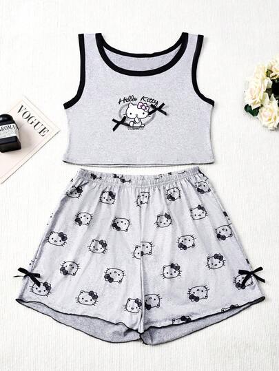  Bộ đồ ngủ Hello Kitty 2 món dành cho nữ, gồm áo croptop và quần short, chất liệu mềm mại và thoáng khí, thoải mái khi mặc ở nhà, thiết kế dễ thương.