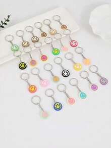 Chaveiros com 14/18/21/24/27/30/40 unidades de carinhas sorridentes e fofas de desenho animado, ideais para lembrancinhas de festa, presentes de Natal e volta às aulas (cor aleatória). - Multicolorido - Ver 5