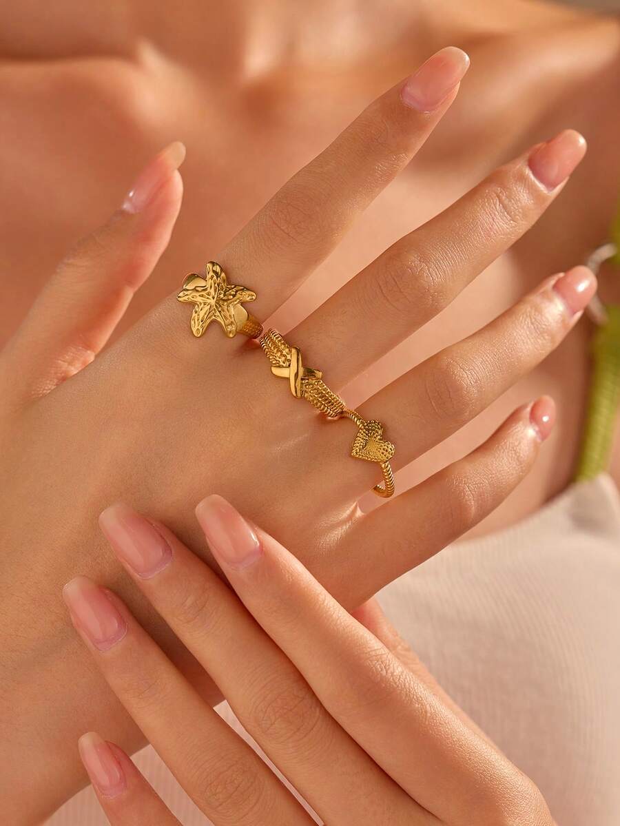 Set de 3 anillos abiertos minimalistas chapados en oro de acero inoxidable, incluye diseños de letra, corazón y estrella de mar, adecuado para uso de mujeres o como regalo - Amarillo Oro - Ver 1