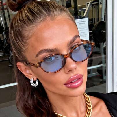 ユニセックス レオパード柄 ブルーレンズ オーバルサングラス 旅行、夏のお出かけ、運転、ビーチ用