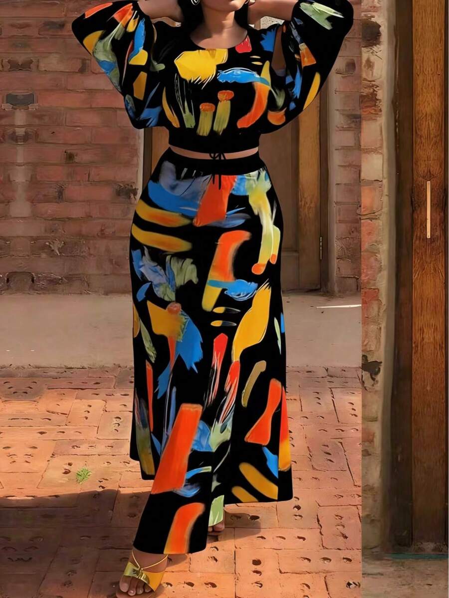 大码女装两件套，圆领灯笼袖露脐上衣和半身裙，休闲宽松版型，适合外出、旅行和街头穿着。适合春、夏、秋季穿着。不对称/不对称印花设计，充满度假海滩风情。优雅黑色 - 黑色 - 查看 1