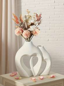 两件套简约现代花瓶，散发着浓郁的斯堪的纳维亚风格。这些花瓶可用于书架装饰，其精致的设计和独特的波西米亚魅力使其成为客厅、玄关或咖啡桌上的绝佳家居装饰品。