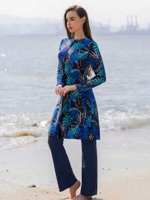 Bộ đồ bơi hai mảnh kiểu Trung Đông gồm tay dài và quần dài, kín đáo dành cho nữ, thích hợp đi biển mùa hè. - Màu xanh lam - Xem 3