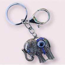 TendenciaLlavero Elefante Ojo Turco Buena Suerte Proteccion PlateadoCalidad premium