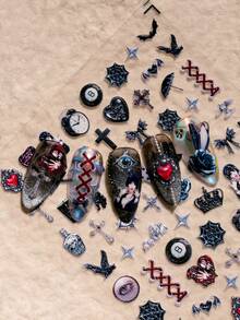 1 Sheet Gothic Punk Style Nail Art Stickers, Detailed And Atmospheric, Includes Classic Dark Symbols Such As Cross, Gem-Like Heart, Black Cat, Coffin, Eyeball, Bat, Spider, Skull Bottle, Gothic Girl, As Well As Retro Elements Like 8-Ball And Clock, Suitable For Personal DIY And Nail Salons