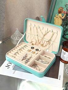 1个PU材质首饰收纳盒，便携式旅行首饰整理盒，梳妆台收纳盒，多隔层旅行首饰展示盒，礼品收纳盒，展示盒，简约翻盖设计，大容量，适合收纳戒指、项链、耳环、手表、口红等饰品，卧室用品，户外旅行用品，纽扣闭合，美观国际风，适合旅行和居家使用，是送给女孩的理想礼物。 - 按扣首飾盒 - 查看 7