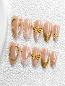 10件套奢华美甲套装，包含棺材形美甲贴片、杏仁形美甲贴片、鸭嘴形美甲贴片、法式美甲贴纸、合金蝴蝶美甲装饰、水滴美甲贴纸、镀金美甲凝胶以及工具套装（1张果冻贴纸+1把指甲锉）。适合女性在派对、节日、婚礼等场合佩戴，是送给她的绝佳礼物。 - 彩色 - 查看 13