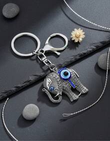 TendenciaLlavero Elefante Ojo Turco Buena Suerte Proteccion PlateadoCalidad premium