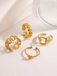 4件套不锈钢简约心形线条设计戒指套装，时尚百搭，适合女性日常佩戴，亦可作为节日礼物。