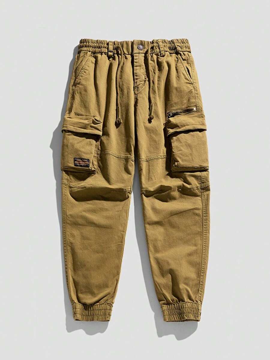 Tu Trabajo Urbano en Movimiento. Pantalón donde el estilo de trabajo cuenta historias, con corte casual que define y versatilidad que no sacrifica el estilo. - amarillo tierra - Ver 1