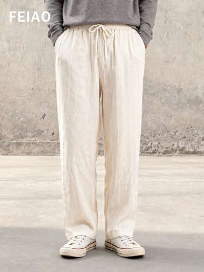 FEIAO 男士复古风复古硬币美学抓绒条纹亚麻质感休闲裤，采用泡泡褶皱设计，适合通勤、休闲、度假等各种场合，四季皆宜，风格百搭。