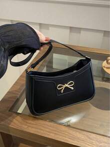 新款时尚休闲PU皮革女士单肩包，黑色、卡其色可选，蝴蝶结装饰，金属配件设计