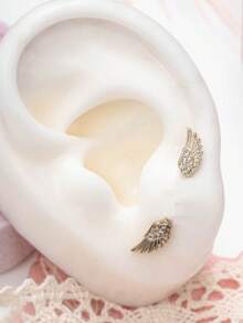 1 Set (+ Ala derecha) Aretes con diseño de alas de ángel de acero de titanio hipoalergénico y suave en estilo punk de color café, adecuado para perforaciones de cartílago de parejas - Pendiente de cartílago con forma de ala - Ver 2