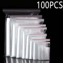 100 قطعة أكياس بلاستيكية قابلة لإعادة الإغلاق بأحجام من 4 سم إلى 30 سم، أكياس سحاب إعادة الاستخدام، سمك 0.062 مم/2.44 ميل، أكياس تعبئة مجوهرات شفافة، أكياس تعبئة هدايا أعياد الميلاد والذكرى السنوية، أكياس ملحقات أدوات متعددة الأغراض، أكياس تعبئة هدايا المناسبات، أكياس فراغية بلاستيكية، أكياس لاصقة شفافة، صناديق تخزين ملحقات الملابس، مناسبة للشحن والسفر والتخزين والتعبئة والهدايا وأعياد الميلاد والذكرى السنوية والزفاف - 100 قطعة - مشاهدة 2