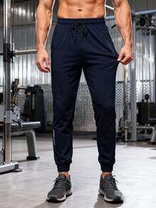 1 chiếc quần jogger nam màu xanh dương, thấm hút mồ hôi, thoáng khí, nhẹ, có dây rút ở eo, thích hợp cho tập luyện thể thao, tập thể dục, mặc hàng ngày, có thể giặt máy, mùa hè. - Màu xanh lam - Xem 2