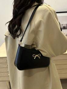 新款时尚休闲PU皮革女士单肩包，黑色、卡其色可选，蝴蝶结装饰，金属配件设计