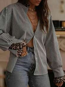 Áo sơ mi nữ ôm dáng mùa xuân và thu này có thiết kế họa tiết da báo, với chất liệu vải thoải mái. Thích hợp cho việc đi làm hàng ngày và những buổi đi chơi thường ngày. Một chiếc áo sơ mi nữ thanh lịch, một chiếc áo dài tay nữ phối họa tiết da báo, một chiếc áo sơ mi kẻ sọc nữ quyến rũ. - Đen và trắng - Xem 3