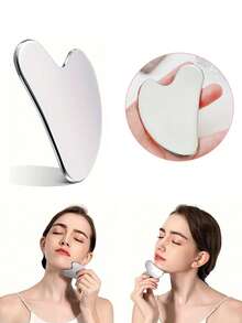 1个不锈钢心形刮痧板，专为娇嫩肌肤护理和全身放松而设计，提供清凉顺滑的按摩体验。心形曲线精准贴合面部和身体轮廓，适用于面部紧致、眼部舒缓、颈部放松和全身肌肉按摩。 - 彩色 - 查看 1