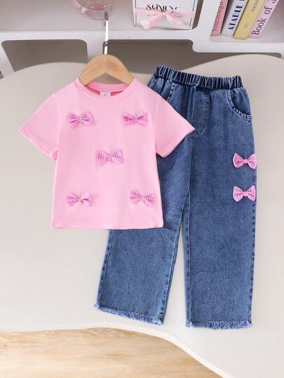 Set de 2 piezas de camiseta de manga corta con cuello redondo y lazo 3D a cuadros y pantalones vaqueros largos para niñas pequeñas, estilo casual y dulce, para verano