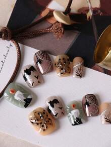 10片亚克力按压式美甲片，蜡烛、蝙蝠、花朵、绿色猫眼图案，短款，适合办公室日常佩戴，人造指甲套装包含1张粘合贴片和1个迷你指甲锉。 - 彩色 - 查看 3