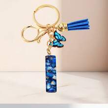 1个蓝色字母钥匙扣，可爱蝴蝶树脂钥匙链，适用于包包、背包、车钥匙，女士日常礼物 - 藍色 - 查看 26