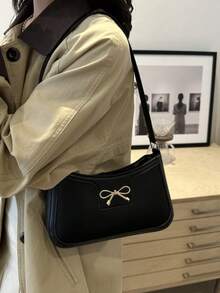 新款时尚休闲PU皮革女士单肩包，黑色、卡其色可选，蝴蝶结装饰，金属配件设计