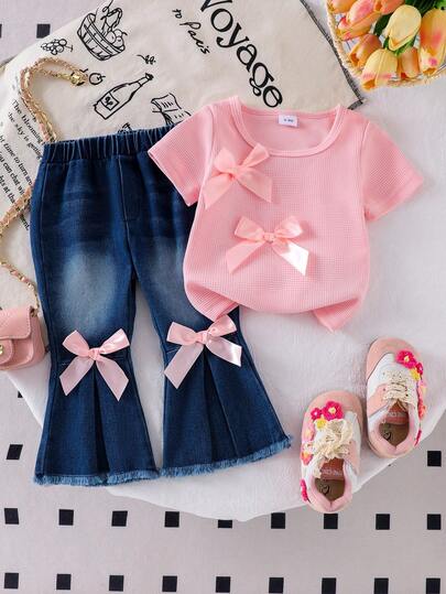 2pcs Baby Girl Sweet Casual Set: 3D Bow Decor Round Neck Short Sleeve T-Shirt Top And 3D Pink Bow Decor Slim Flare Leg Frayed Hem Denim Pants Outfit