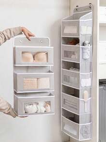 新款多功能门后收纳整理袋，单层/三层/五层可选。这款可折叠衣柜收纳袋是返校季的理想之选，透明窗口设计节省空间，是储藏室、学校、浴室、卧室、厨房、宿舍和房车等场所的完美家居收纳方案。 - 彩色 - 查看 2