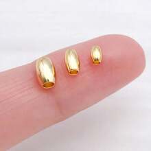 15颗18K镀金米粒珠，小椭圆橄榄形，光滑无缝，散装金属隔珠连接器，适用于珠宝制作、手链、项链、DIY工艺品配件