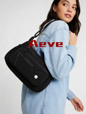 休闲尼龙面料单肩包，配有可调节肩带、多隔层、纯色、拉链封口和涤纶衬里，轻便易携，适合日常斜挎。