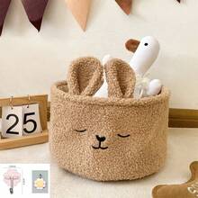 咖啡棕色布艺兔子收纳篮 | 咖啡棕色布艺卡通毛绒兔子收纳篮，刺绣设计，非常适合收纳零食、玩具和化妆品，是卧室、书桌和汽车内饰收纳的理想之选。 - 彩色 - 查看 11