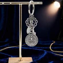 One Religious Novelty Keychain, A Circular Keychain With Multiple Accessories Assembled Together. The Keychain Of Saint Benedict And The Virgin Mary Cross, A Religious Prayer Protection Keychain Pendant, Can Be Used For Packaging, Decorating Mobile Phones, And Is A Beautiful Creative Gift. - 1 - Xem 6