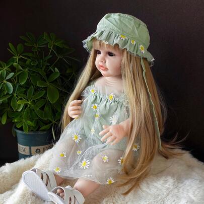 22英寸（约55厘米）逼真重生娃娃，全乙烯基身体，长发公主风，绿色雏菊连衣裙，沐浴玩耍伴侣，生日礼物（包含奶瓶、安抚奶嘴、尿布、出生证明）