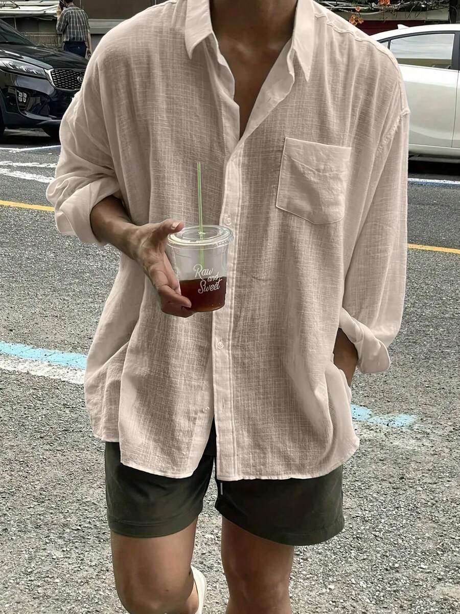 Áo sơ mi nam dài tay, màu trơn, cài một hàng cúc, có túi, dáng rộng, thích hợp mặc mùa thu. - Màu Khaki - Xem 1