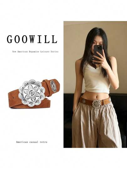 一条西部风格真皮腰带，配银色花卉扣，是复古牛仔装扮的理想之选。一款适合所有季节的百搭配饰。