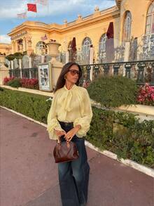 Áo kiểu nữ thanh lịch, cổ đứng, tay dài, chất liệu xuyên thấu - viền bèo nhún, tay phồng, xếp ly phía trước, chất liệu mỏng, cài nút phía trước, dáng rộng, thích hợp cho mùa hè. - Vàng nhạt - Xem 2