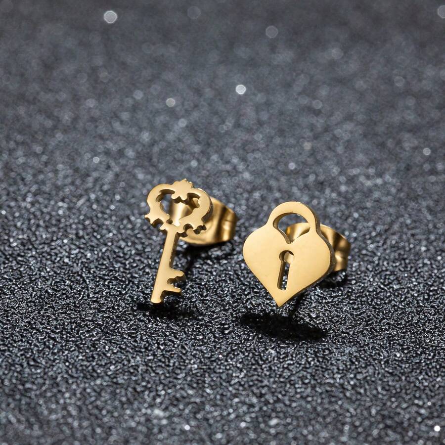 1 paire de boucles d'oreilles à clé asymétrique à la mode, en acier inoxydable doré, accessoire élégant pour tous les jours, convient pour les fêtes et les cadeaux
