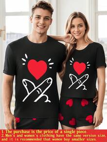 Manos formando un corazón rojo que simboliza el amor compartido y la conexión sincera entre parejas expresando ternura y unión profunda camiseta de mujer pareja 100% algodón 220g - Negro - Ver 8