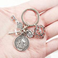 One Religious Novelty Keychain, A Circular Keychain With Multiple Accessories Assembled Together. The Keychain Of Saint Benedict And The Virgin Mary Cross, A Religious Prayer Protection Keychain Pendant, Can Be Used For Packaging, Decorating Mobile Phones, And Is A Beautiful Creative Gift. - 1 - Xem 3