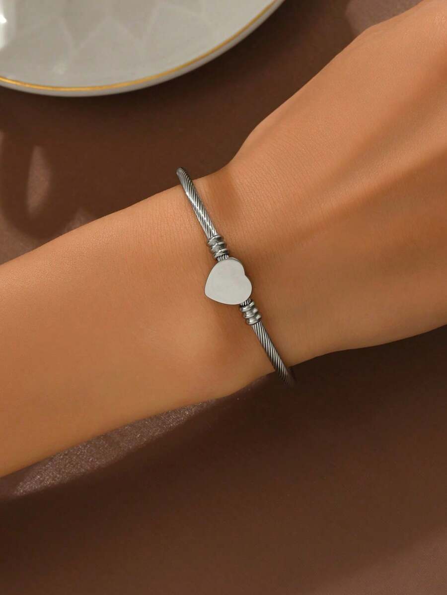 1 chiếc vòng tay hình trái tim bằng thép titan không phai màu, trang sức đôi.