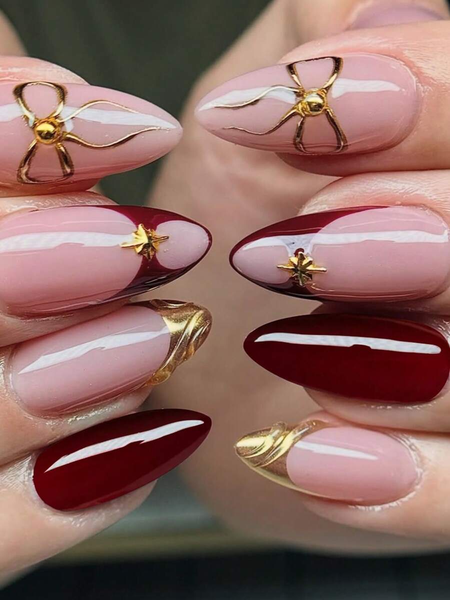 Bộ 24 miếng dán móng tay hình hạnh nhân màu đỏ tía trang nhã, kiểu Pháp, điểm xuyết nơ và ruy băng vàng. Những miếng dán móng tay lấp lánh, phủ kín toàn bộ bề mặt này rất thích hợp làm quà tặng năm mới cho phái nữ, dùng hàng ngày hoặc tự trang trí trong các bữa tiệc. (Dụng cụ làm móng) - Nhiều màu - Xem 1