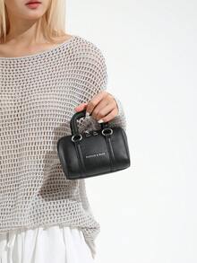 这款全新迷你圆筒手套斜挎包造型精美，复古时尚，休闲简约又不失优雅。它采用拉链设计和可调节肩带，非常适合青少年、购物和旅行使用。这款包包容量充足，可轻松收纳日常必需品，是一款百搭时尚单品。它风格百搭，适合各种场合。 - 簡約圓筒手提包 - 查看 12