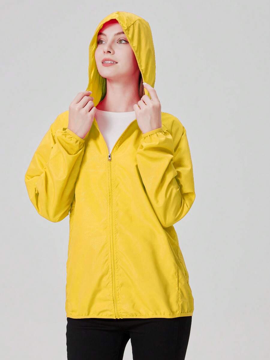 1件女款夏季超薄連帽運動外套，純色長袖女上衣，附收納口袋，黃色