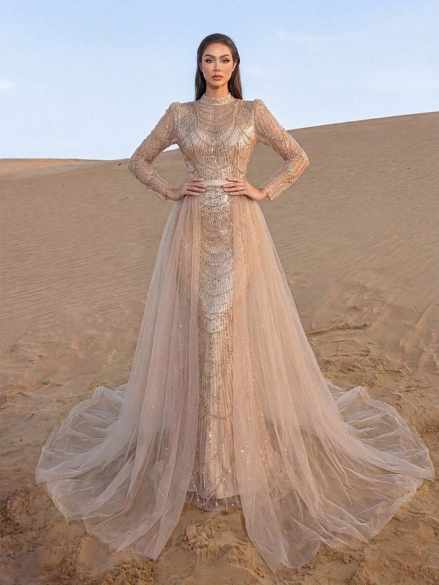 Faeriesty 高级魅力优雅串珠薄纱覆盖晚礼服，带有几何图案 - 透明网眼袖子，束腰缎带和 A 字裙摆，适合豪华婚宴、慈善晚会和时尚颁奖典礼 - 香檳色 - 查看 1